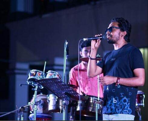 Belal Khan performing live with percussionist